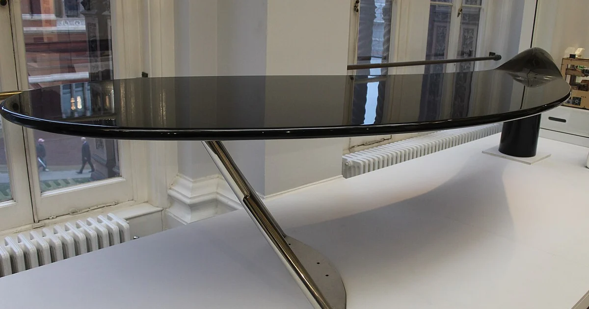 Bespoke office desk in black fibreglass, resin, wood and metal by FutureSystems, UK, Made in London in 1999. Museum number W.10-2019